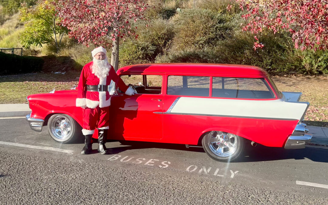 Santa Visits Mike Choate Center in a Classic 1957 Chevy